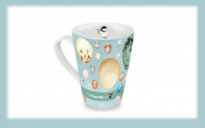 photograph of a mug with illustrations of bird eggs.