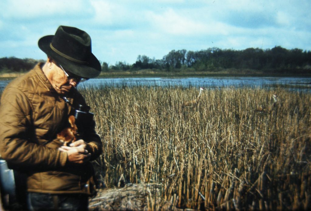 Larry Walkinshaw Holding a Young Crane, 1973.