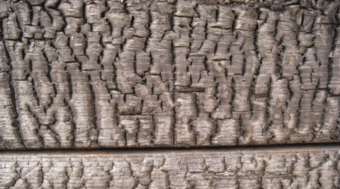 Charred wooden boards